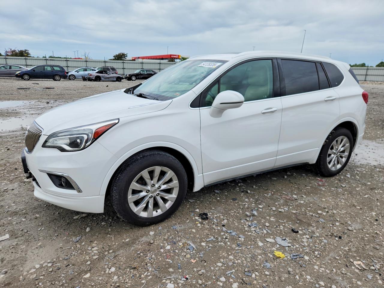2018 Buick Envision Essence, VIN LRBFX1SA8JD006557 — Hail