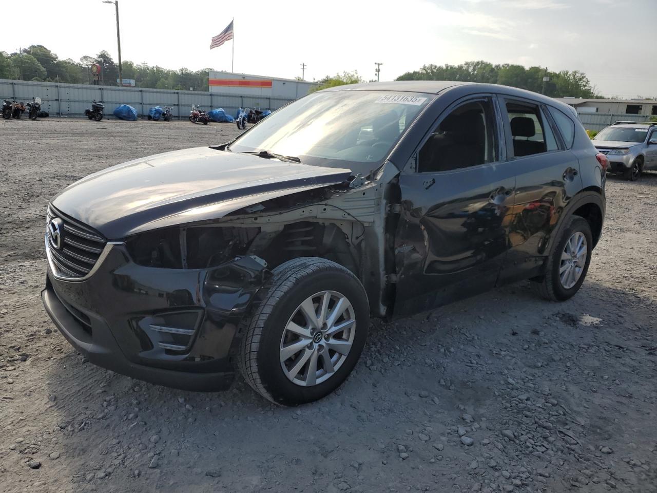 2016 Mazda CX-5 Sport, VIN JM3KE4BY6G0749973 — Rejected repair