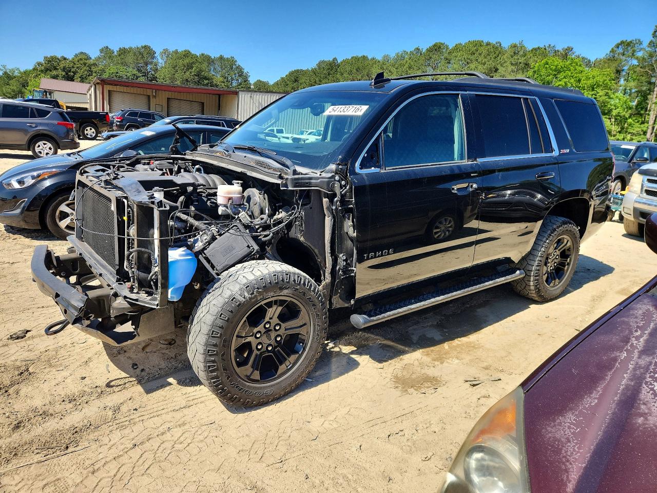 2019 Chevrolet Tahoe LT, VIN 1GNSKBKC1KR285741 — Front end