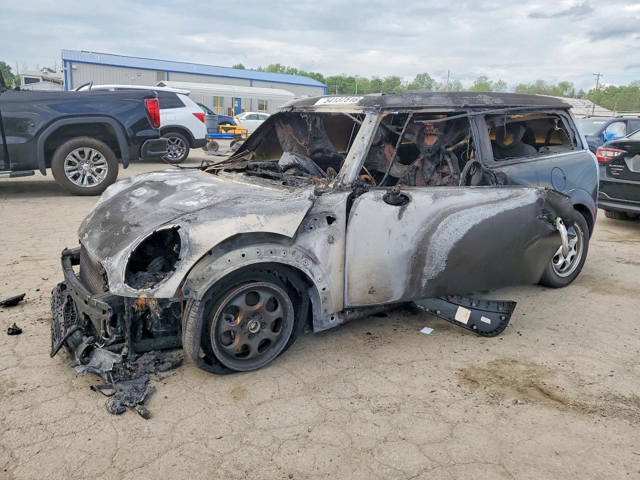 2014 MINI Clubman, VIN WMWZF3C59ET493503 — Engine fire