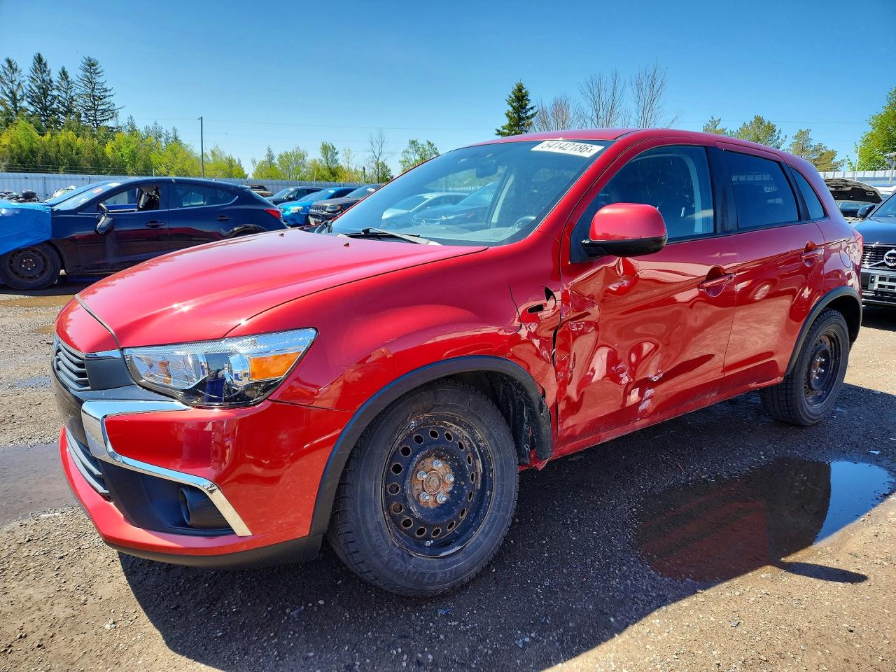 2017 Mitsubishi Outlander Sport ES, VIN JA4AH3AU8HZ612271 — Side