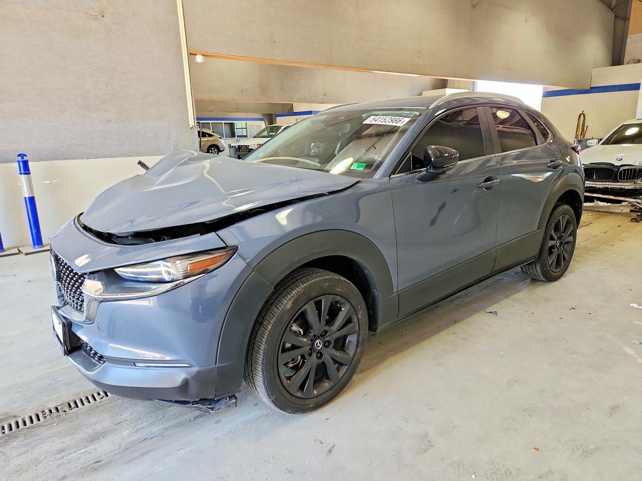 2022 Mazda CX-30 S Carbon Edition, VIN 3MVDMBCL6NM402728 — Front end