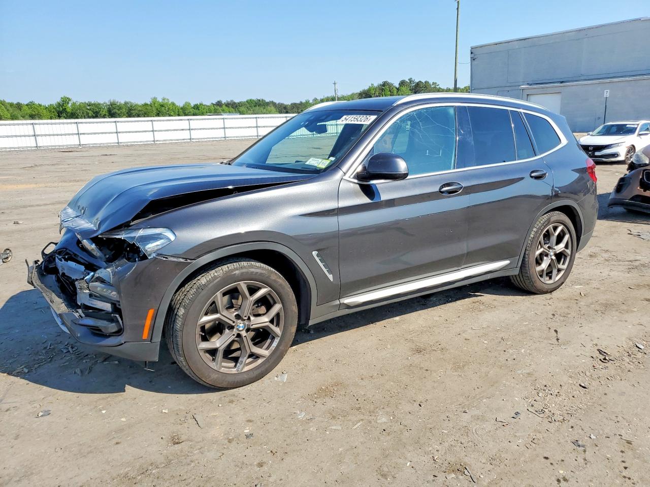 2021 BMW X3 xDrive30i, VIN 5UXTY5C0XM9E30488 — Front end