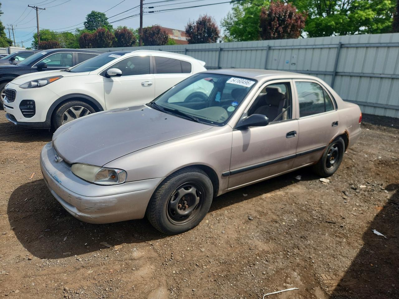 2001 Chevrolet Prizm, VIN 1Y1SK52811Z413167 — Side