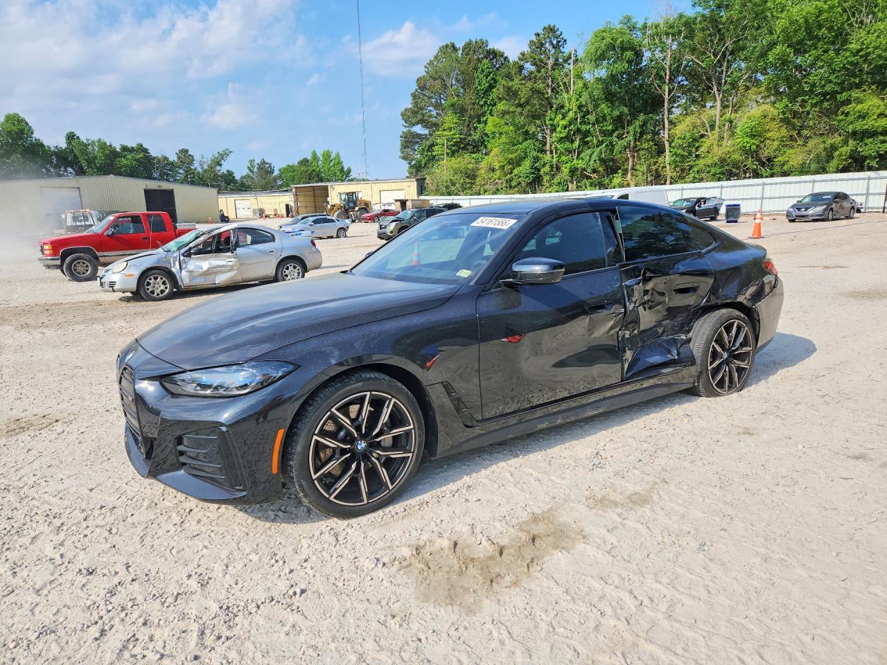 2022 BMW i4 eDrive40, VIN WBY73AW01NFN10167 — Side