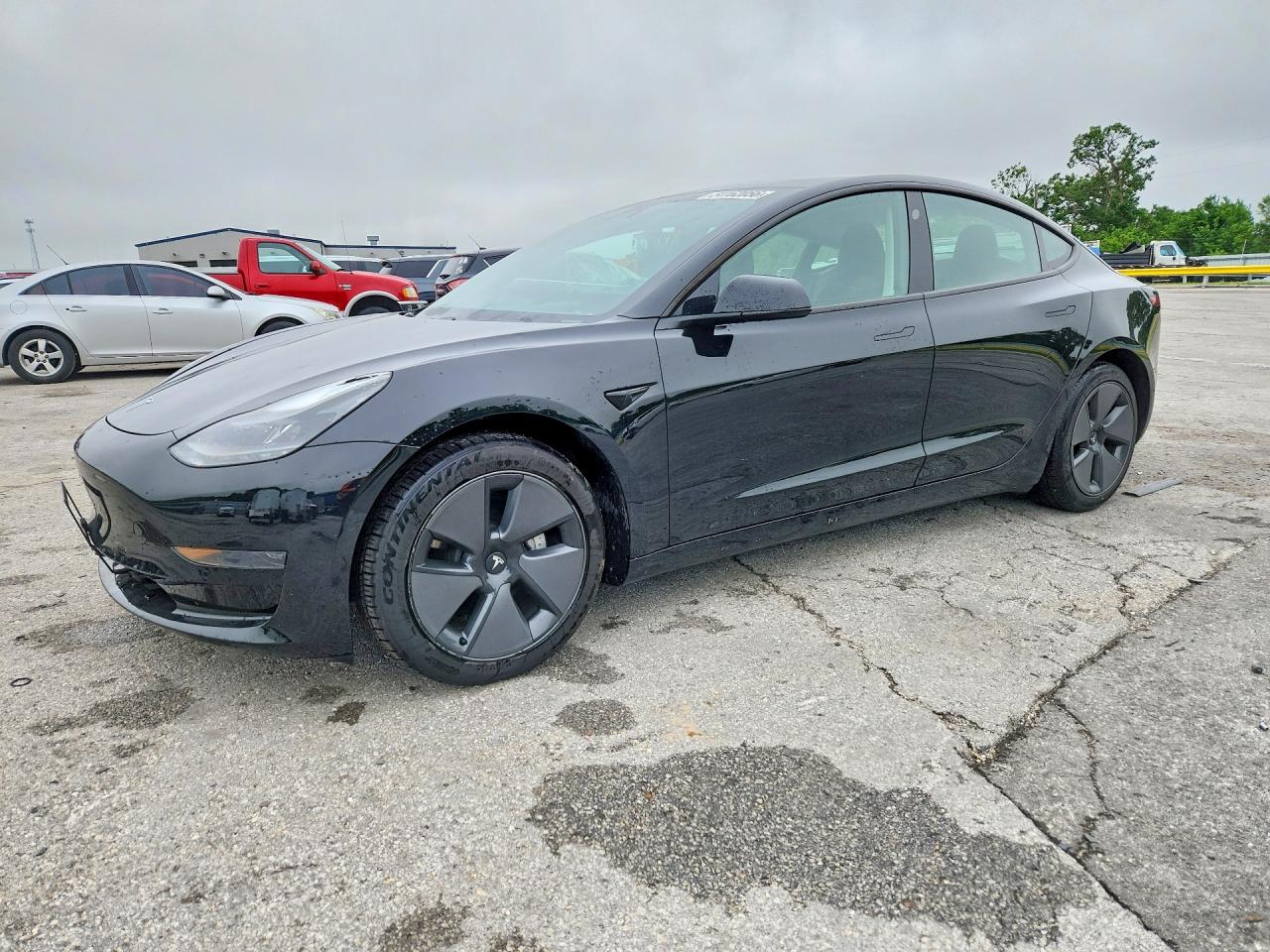 2021 Tesla Model 3 Standard Range Plus, VIN 5YJ3E1EA0MF907067 — Град
