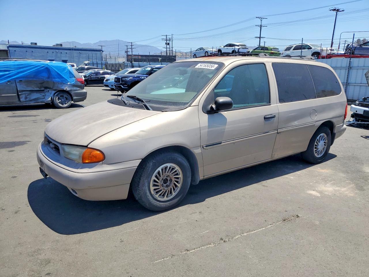 1998 Ford Windstar LX, VIN 2FMZA5141WBC98340 — Minor dents and scratches