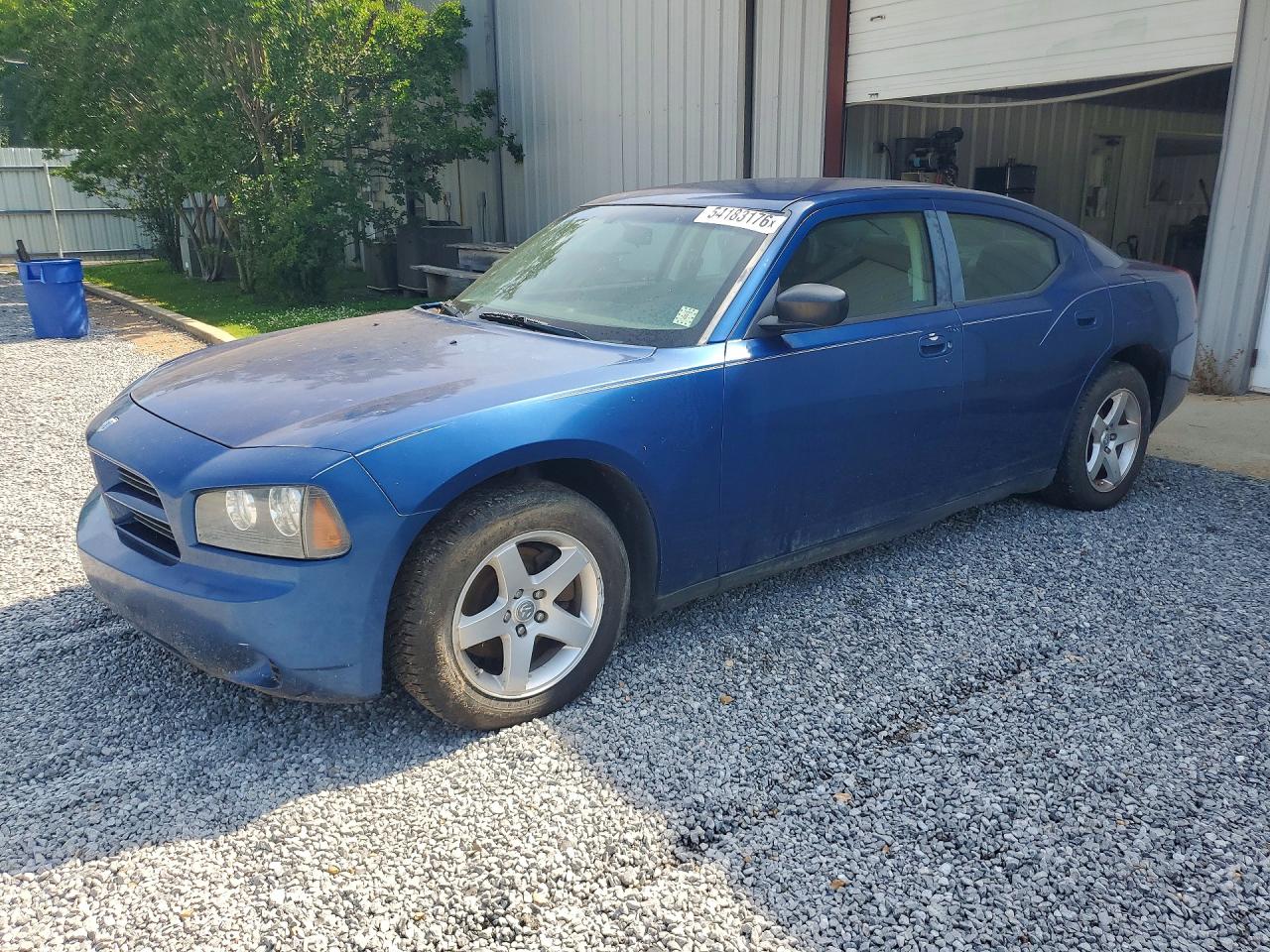 2009 Dodge Charger SE, VIN 2B3KA43D89H554084 — Мелкие вмятины и царапины