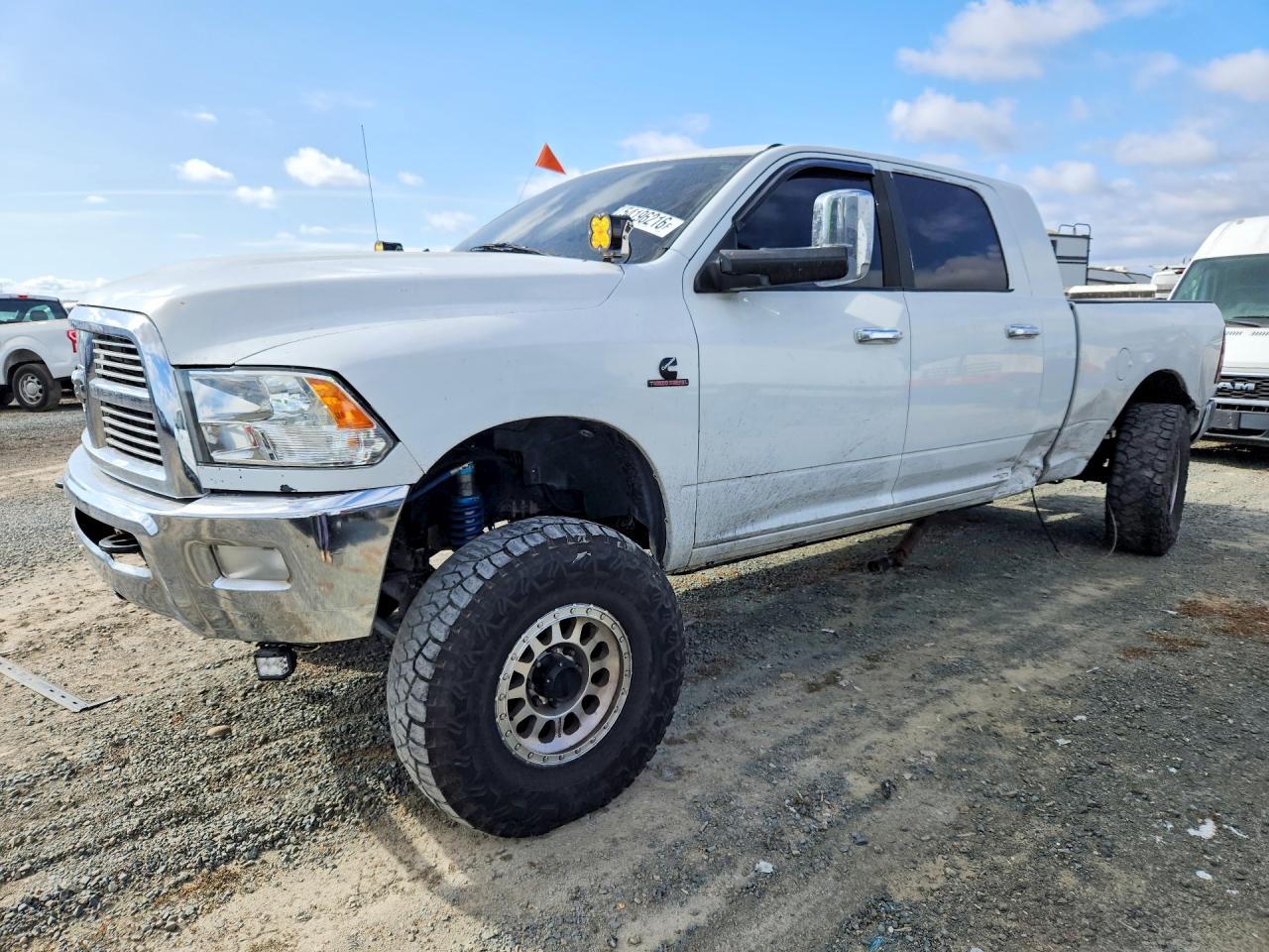 2011 Ram 2500 Laramie, VIN 3D7UT2HL0BG590031 — Side