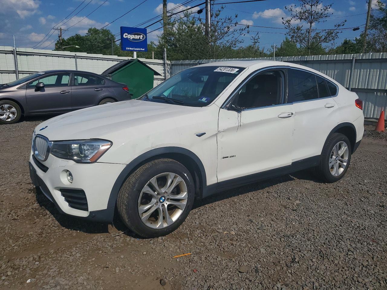 2017 BMW X4 xDrive28i, VIN 5UXXW3C34H0T80507 — Side