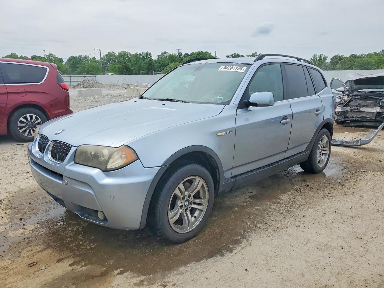 2006 BMW X3 3.0i, VIN WBXPA93496WG83715 — Зад