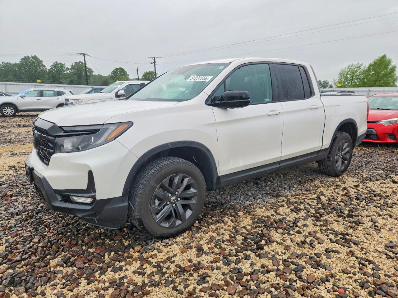 2025 Honda Ridgeline Sport, VIN 5FPYK3F1XSB032030 — Hail
