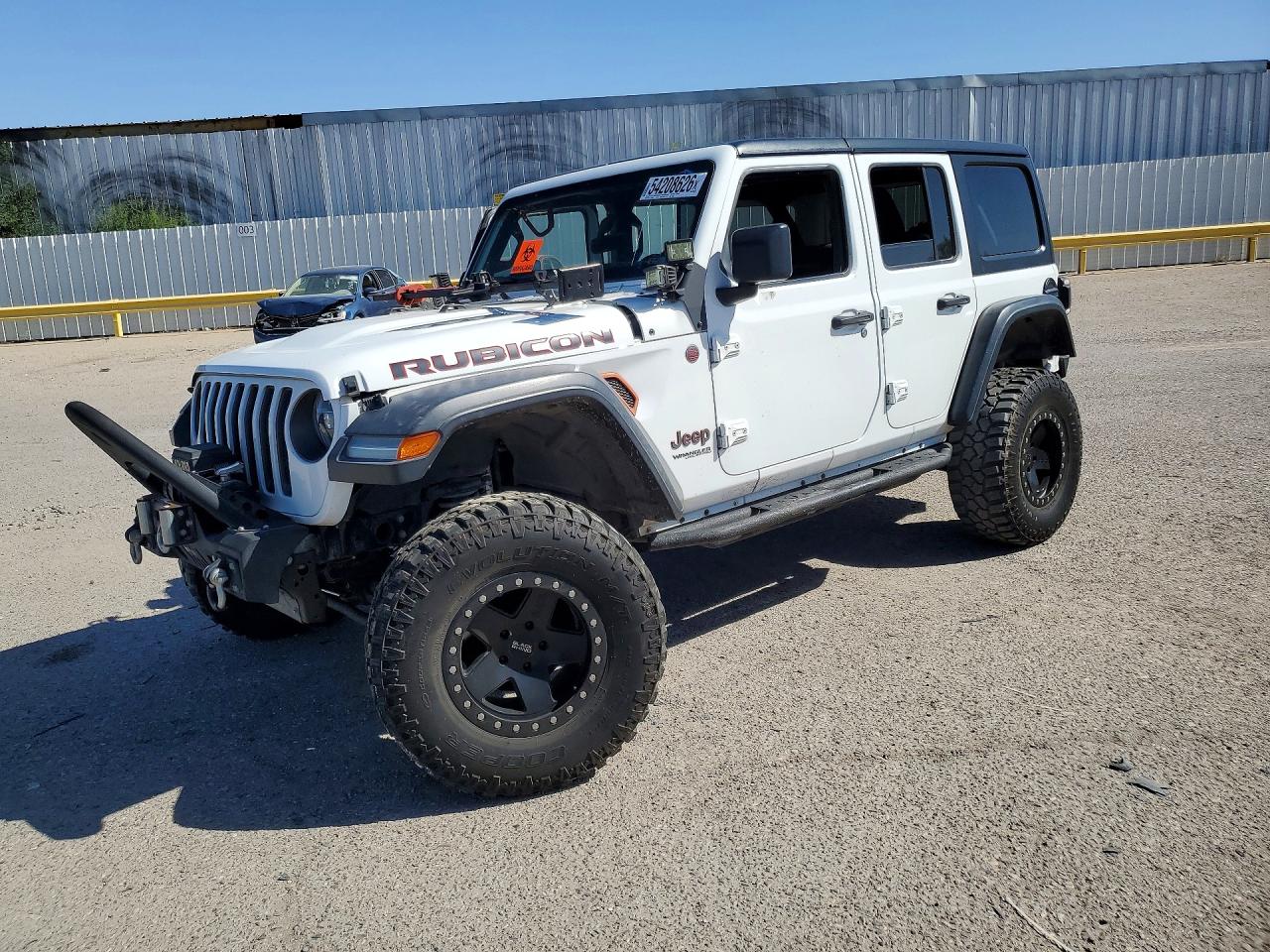 2018 Jeep Wrangler Unlimited Rubicon, VIN 1C4HJXFNXJW199309 — Side