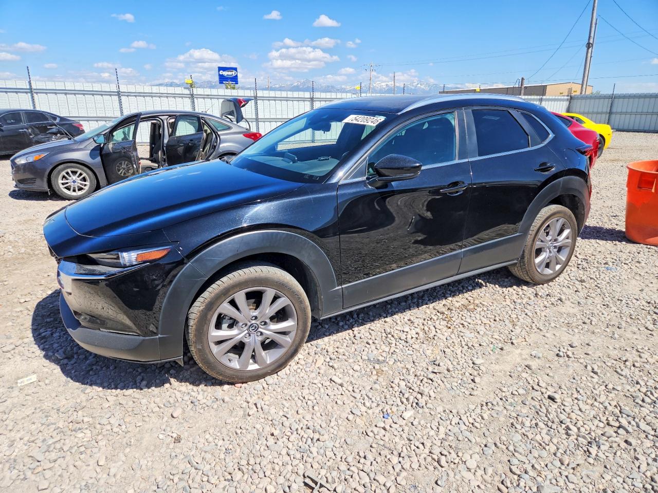 2022 Mazda CX-30 S Carbon Edition, VIN 3MVDMBCL7NM423510 — Side