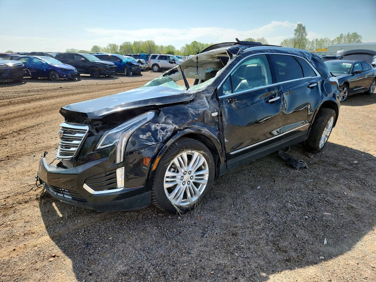 2017 Cadillac XT5 Premium Luxury AWD, VIN 1GYKNERS4HZ228094 — Rollover