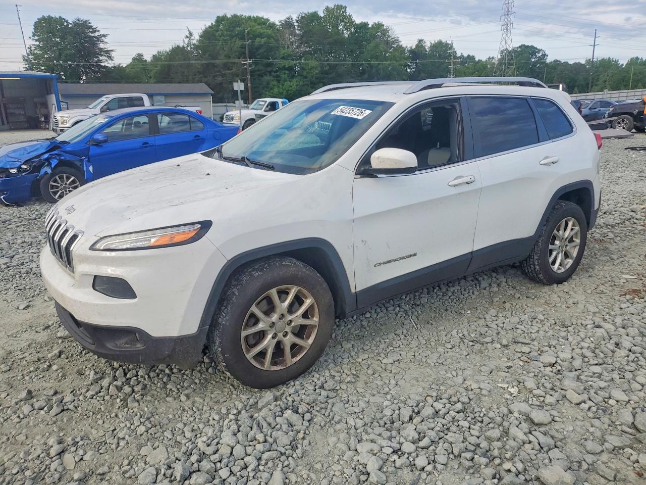 2014 Jeep Cherokee Latitude, VIN 1C4PJMCB8EW150331 — Бок