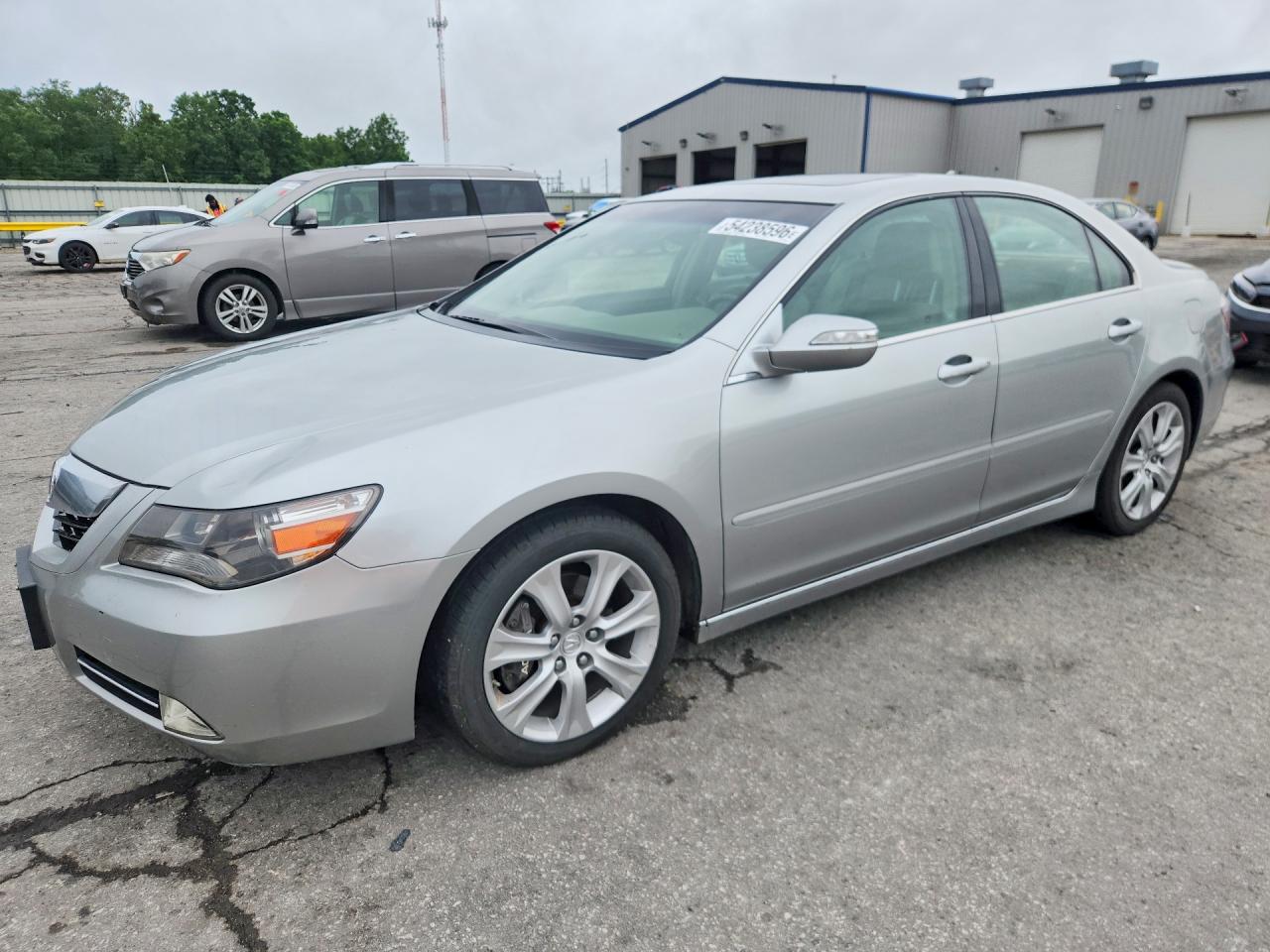 2010 Acura RL Technology, VIN JH4KB2F62AC000557 — Hail