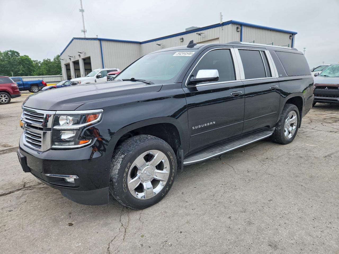 2015 Chevrolet Suburban LTZ, VIN 1GNSKKKC0FR540613 — Hail