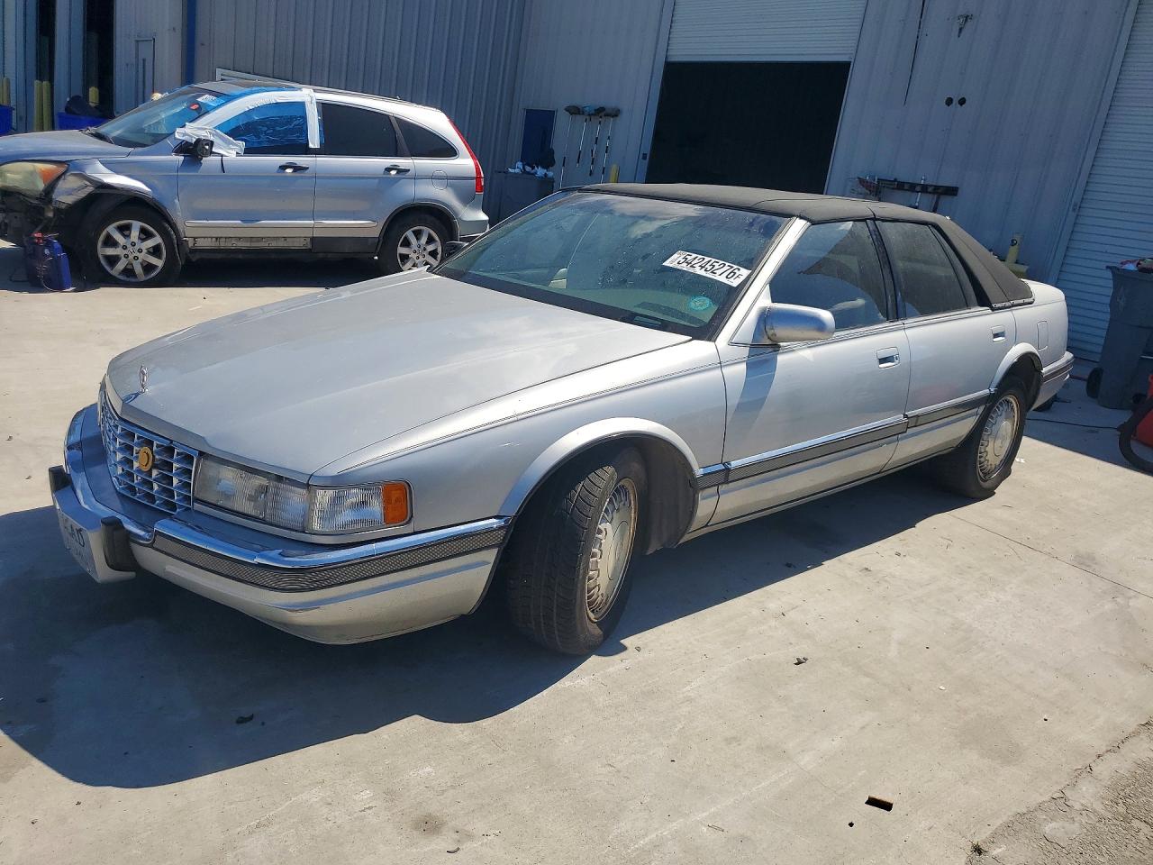 1994 Cadillac Seville SLS, VIN 1G6KS52YXRU840332 — Side