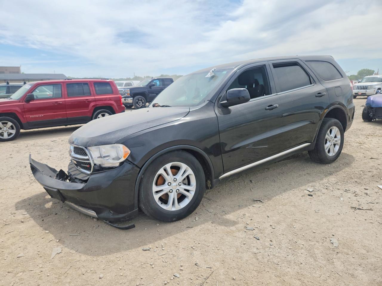 2013 Dodge Durango SXT, VIN 1C4RDJAG1DC672764 — Side