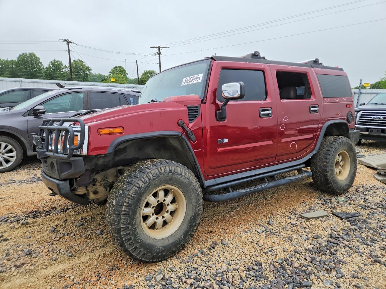 2004 Hummer H2, VIN 5GRGN23U74H105456 — Hail
