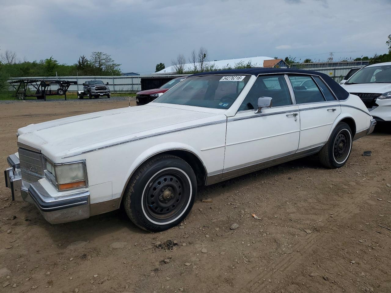 1985 Cadillac Seville, VIN 1G6KS6989FE811566 — Hail