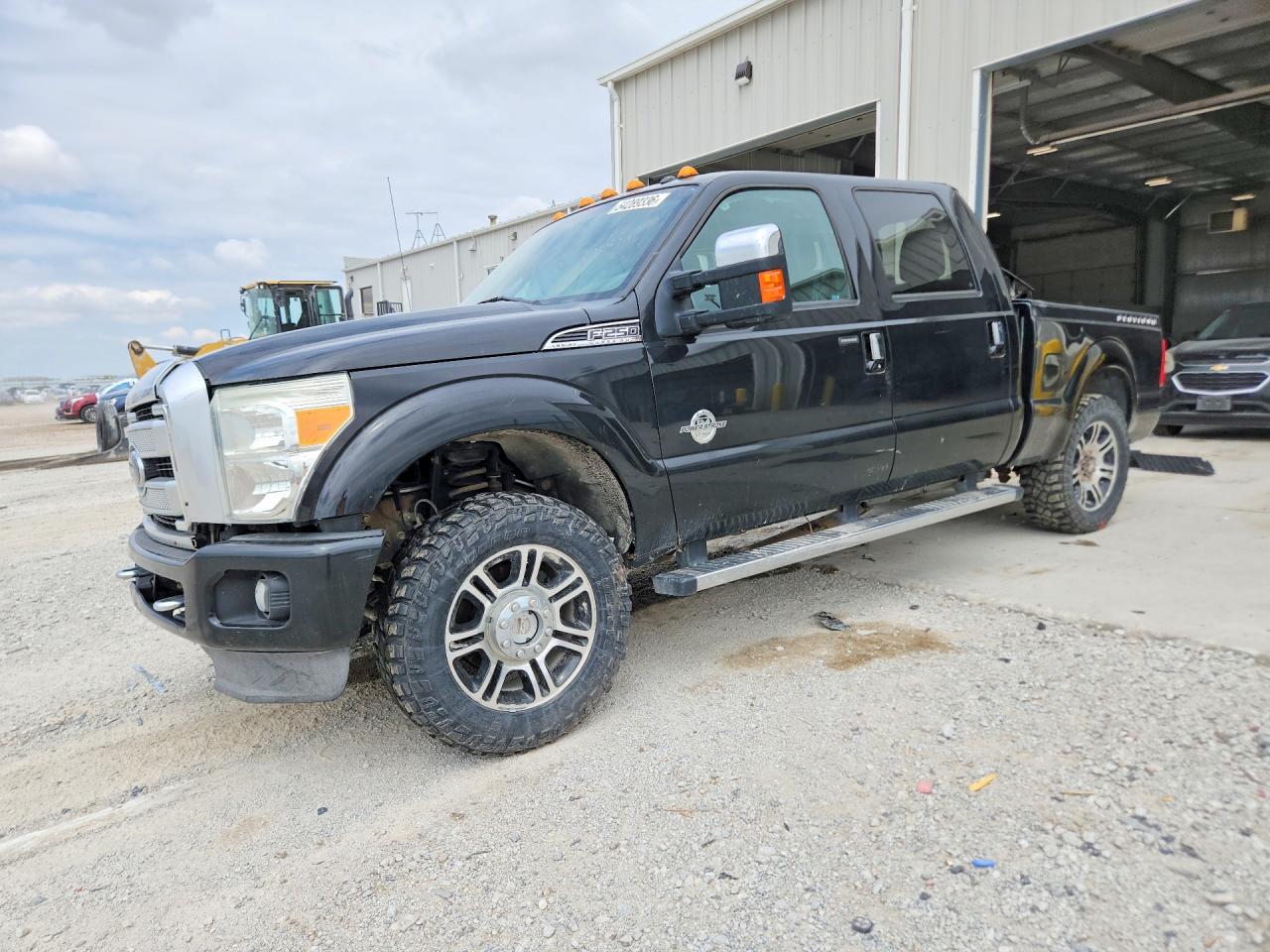 2014 Ford F-250 Platinum, VIN 1FT7W2BT3EEA21175 — Side