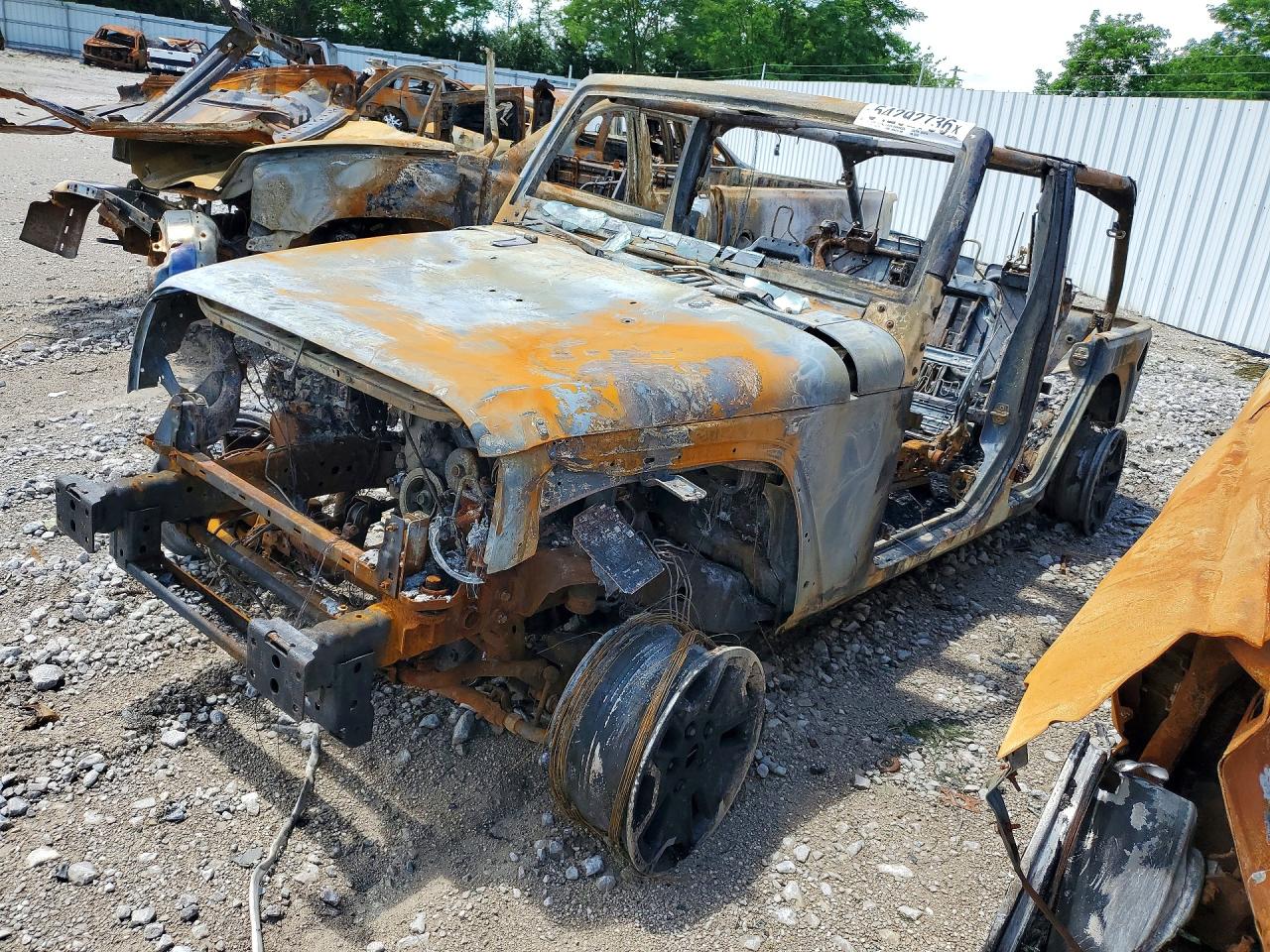 2017 Jeep Wrangler Unlimited Willys Wheeler, VIN 1C4BJWDG6HL586522 — Burn