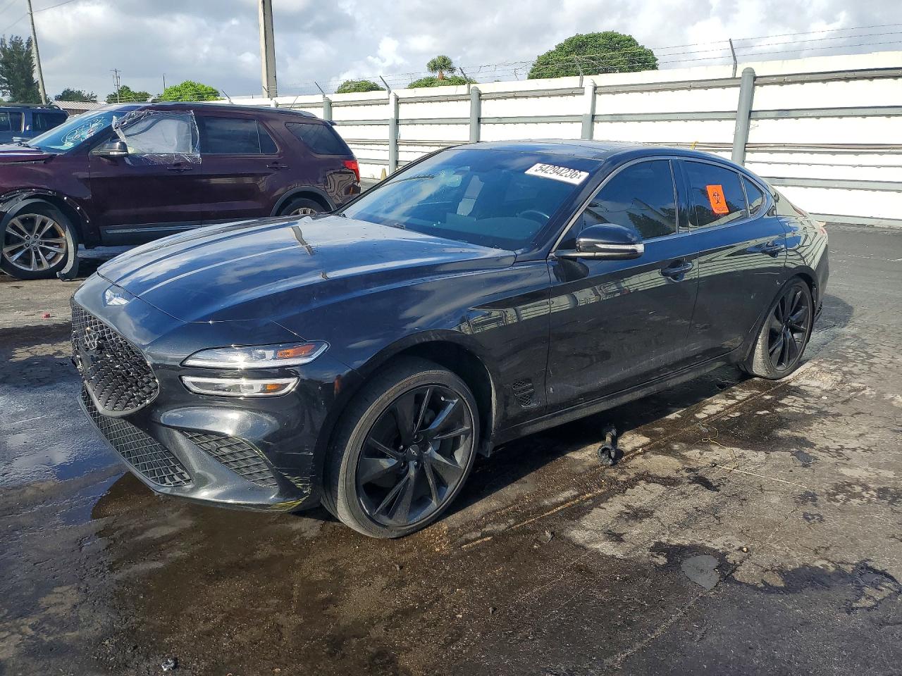 2023 Genesis G70 2.0T, VIN KMTG34TA6PU121850 — Side