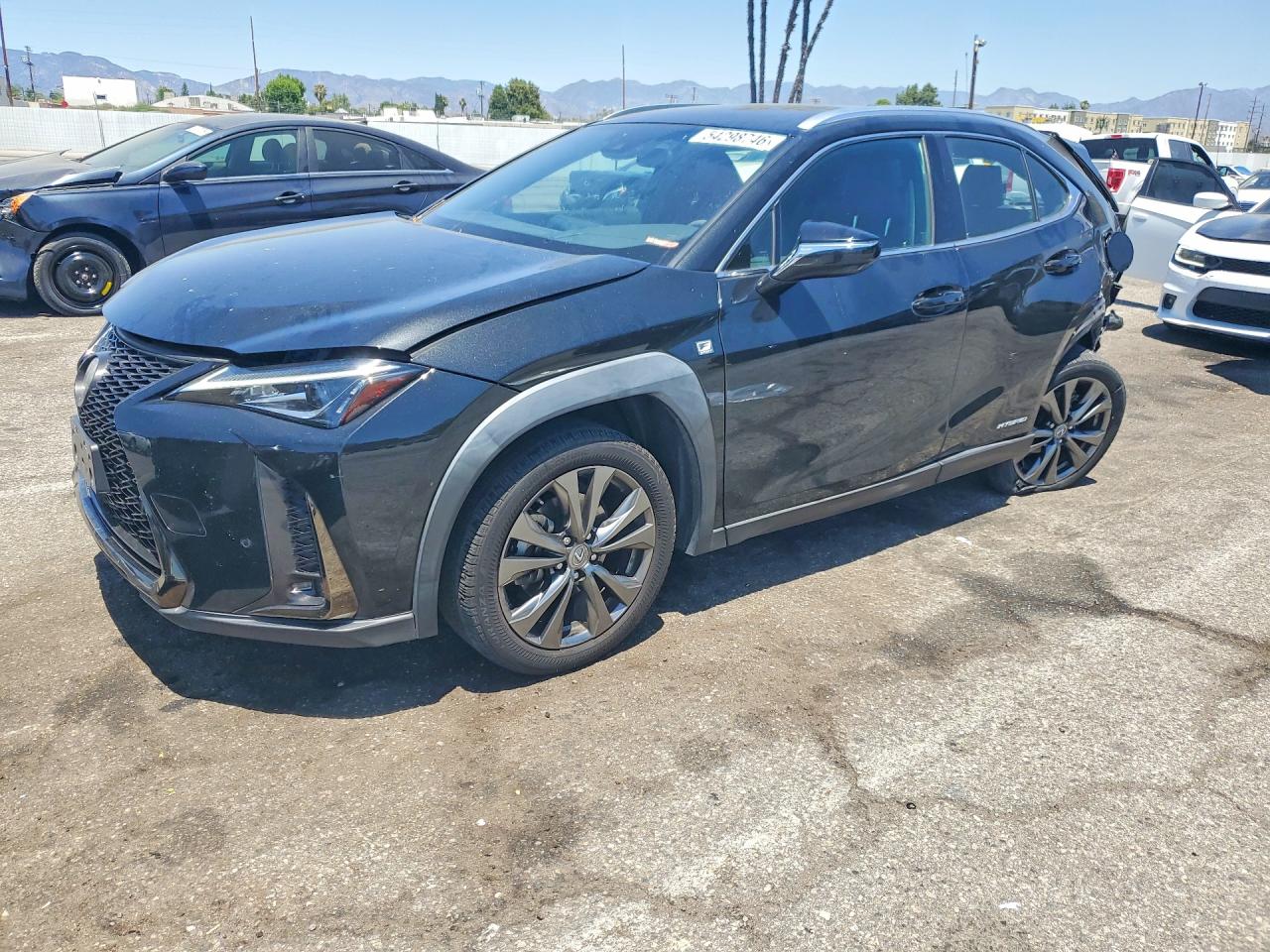 2021 Lexus UX 250h F Sport, VIN JTHE9JBHXM2047842 — Зад