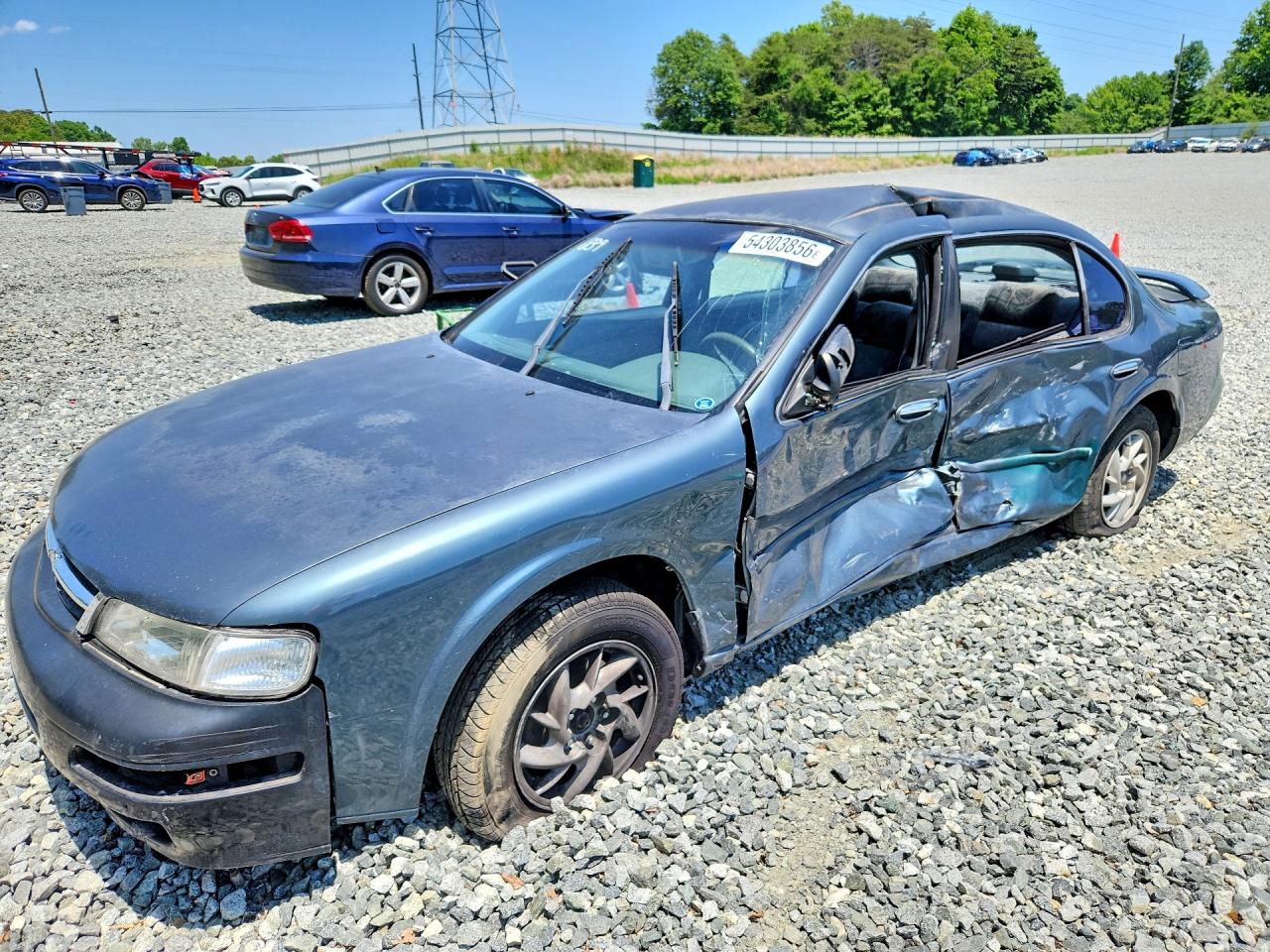 1997 Nissan Maxima GXE, VIN JN1CA21D3VT811839 — Бок
