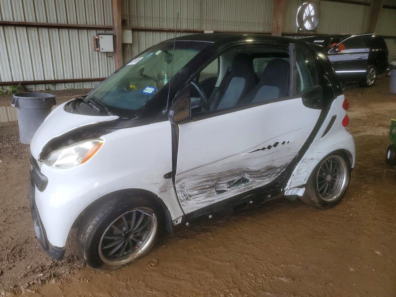 2015 Smart fortwo Pure, VIN WMEEJ3BA1FK801187 — Side