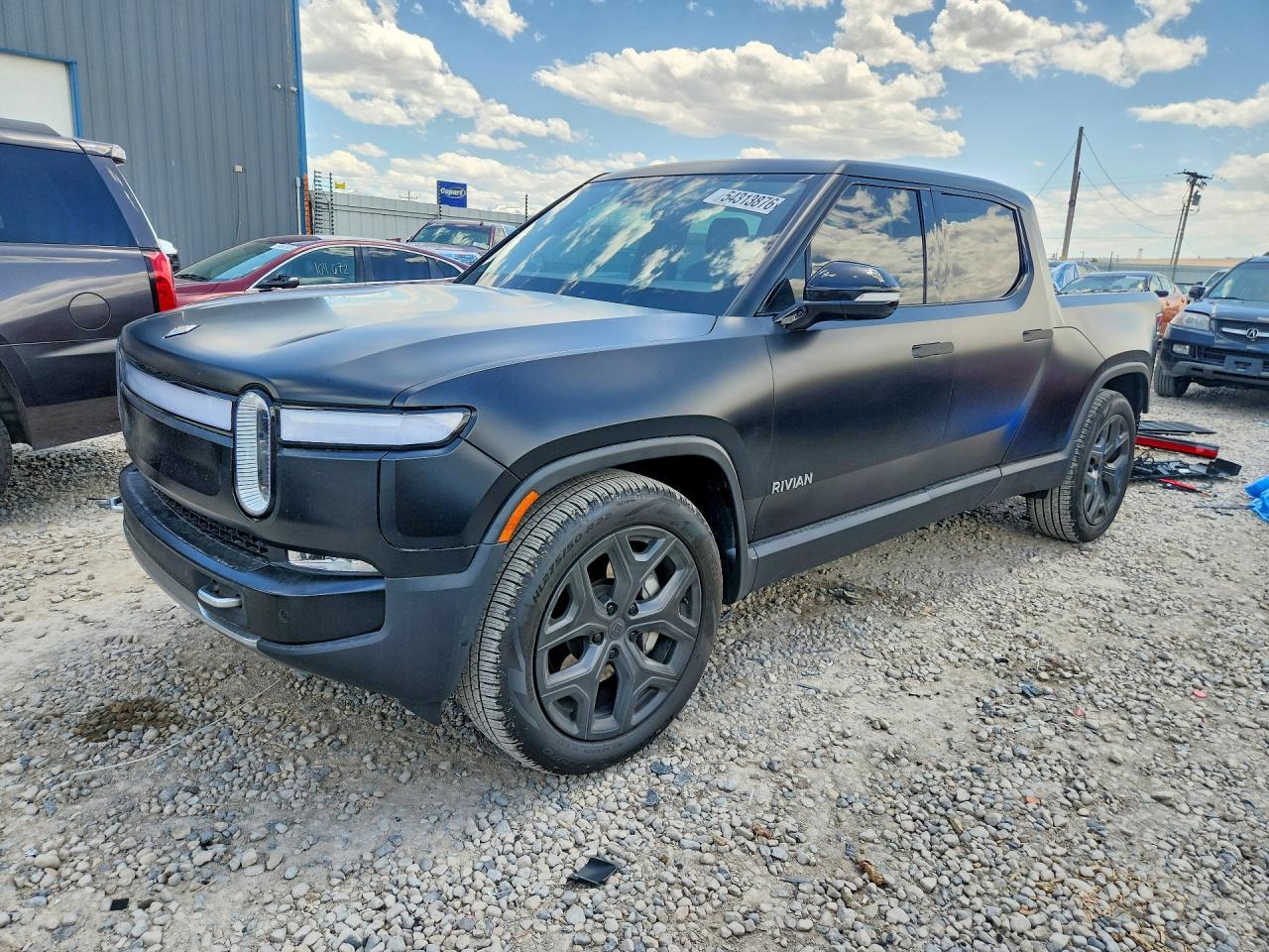 2023 Rivian R1T Adventure, VIN 7FCTGBAA4PN029911 — Rear end