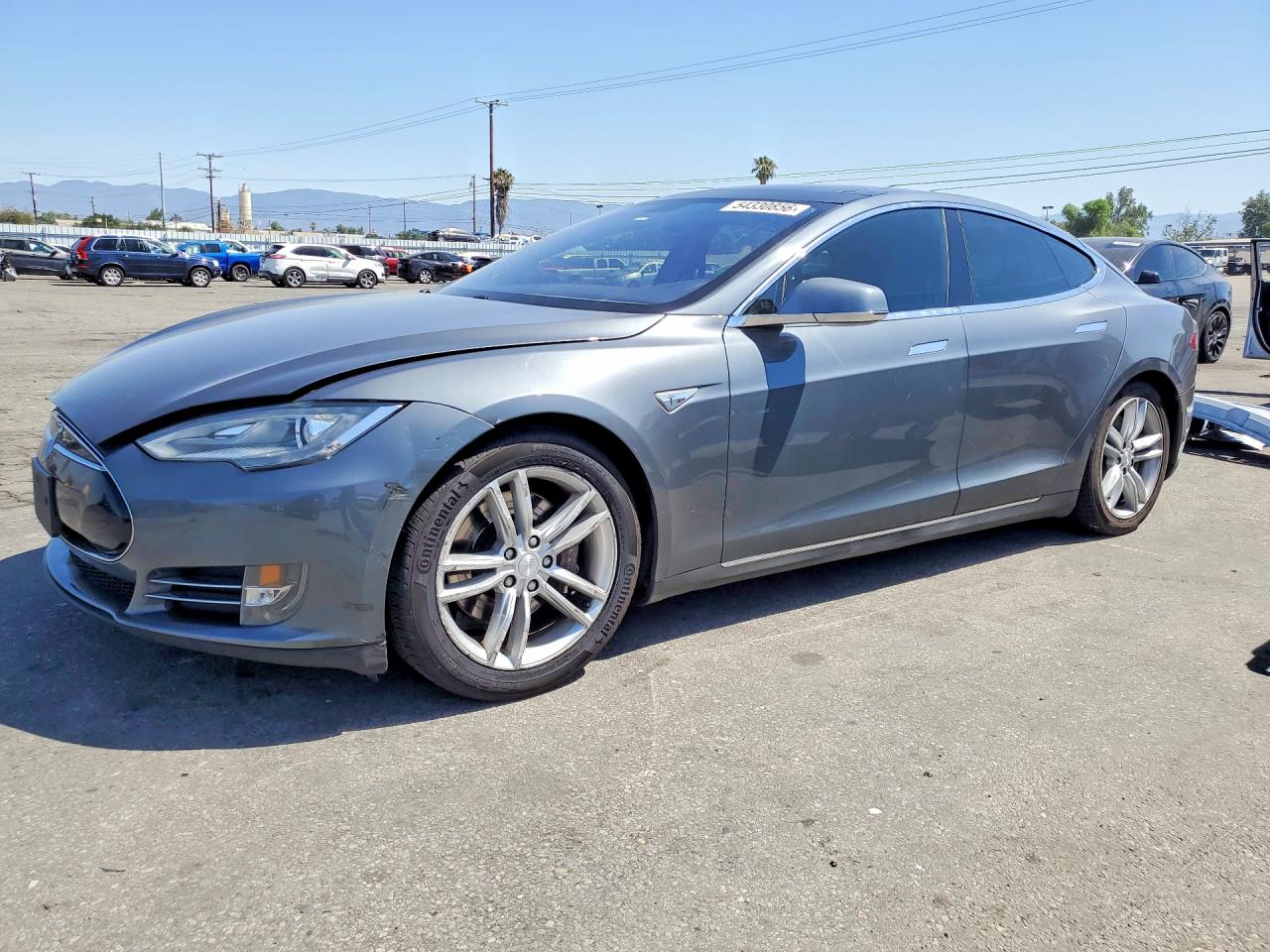 2012 Tesla Model S, VIN 5YJSA1DNXCFP02608 — Бок