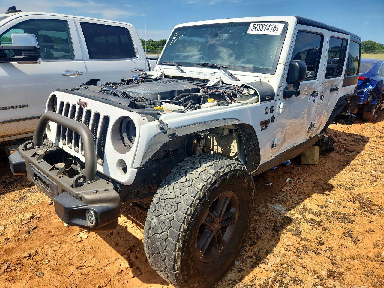 2016 Jeep Wrangler Unlimited 75th Anniversary, VIN 1C4BJWEG2GL338183 — Бок