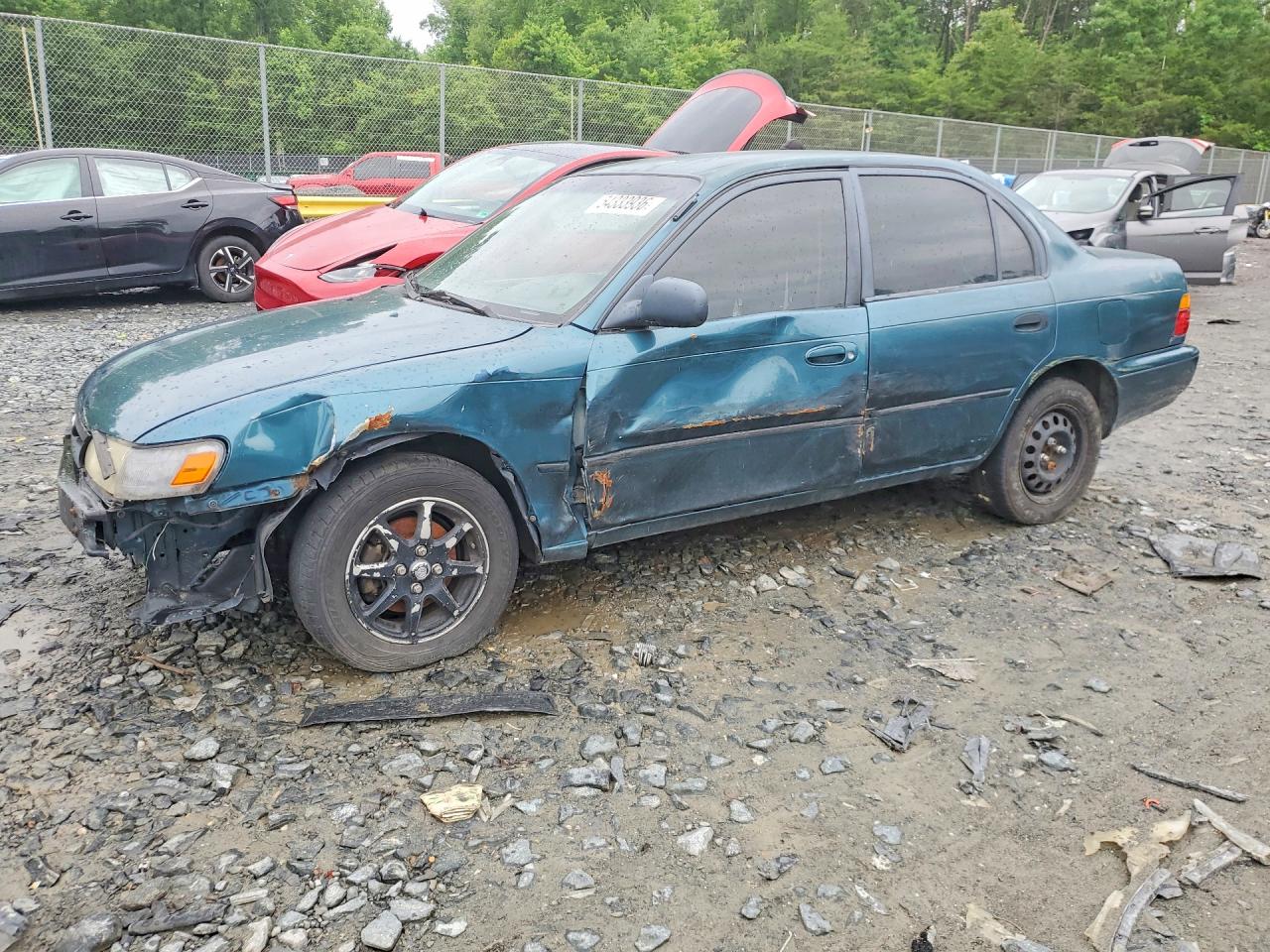 1994 Toyota Corolla Deluxe, VIN 2T1AE09B1RC068580 — Front end