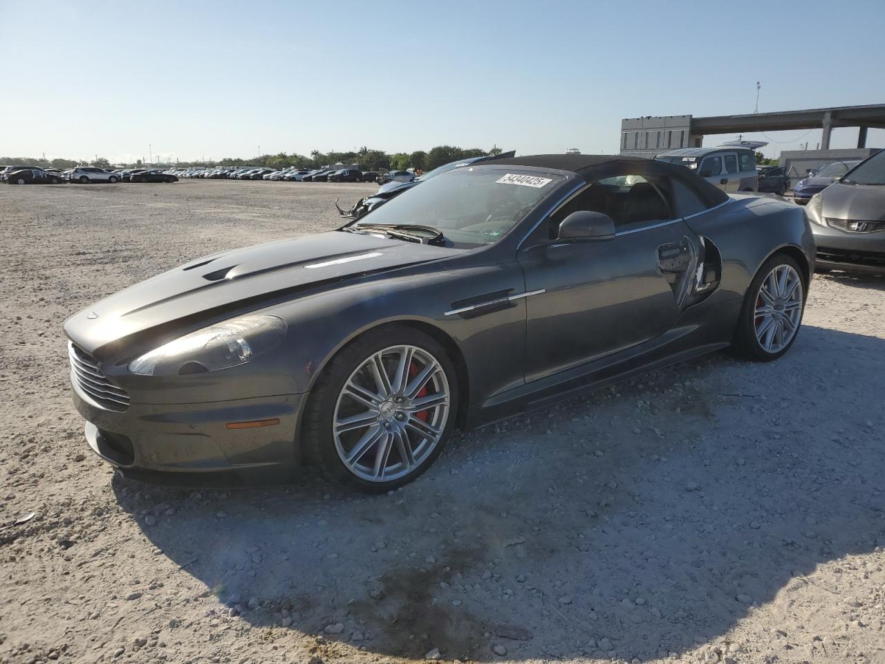 2012 Aston Martin DBS, VIN SCFFDCCD0CGE13017 — Бок