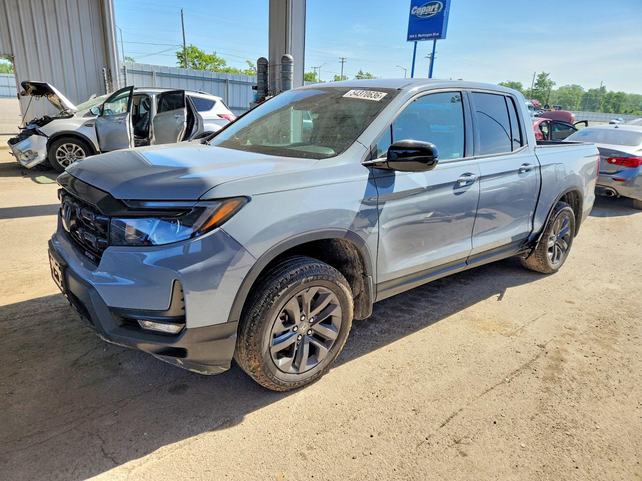 2024 Honda Ridgeline Sport, VIN 5FPYK3F14RB016450 — Side