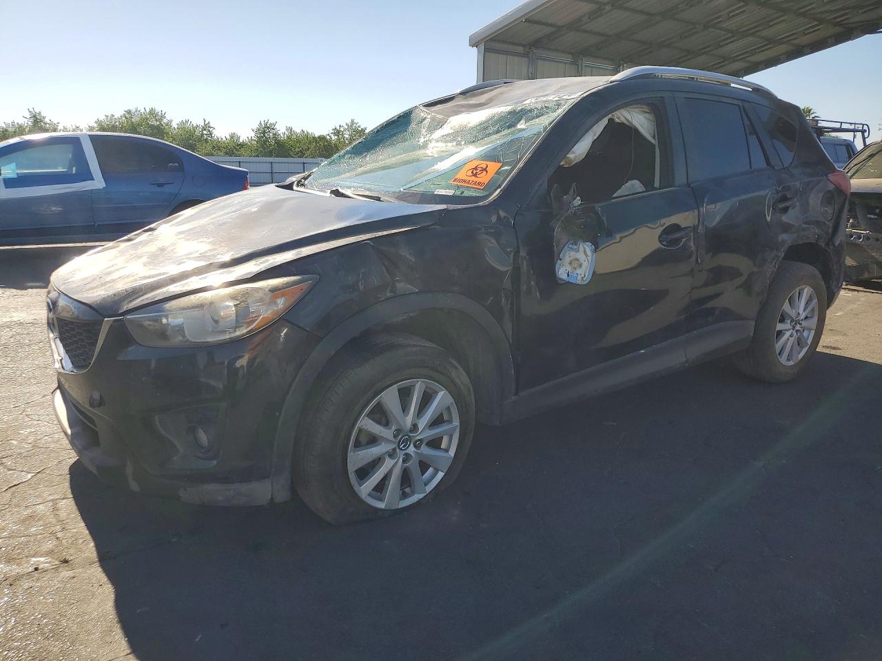 2014 Mazda CX-5 Touring, VIN JM3KE4CY9E0327773 — Rollover