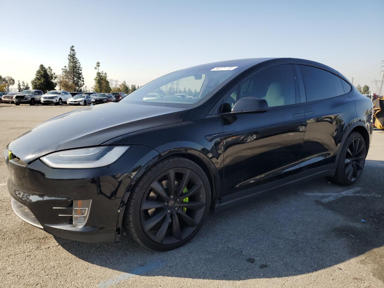2019 Tesla Model X 75D, VIN 5YJXCDE21KF154387 — Side