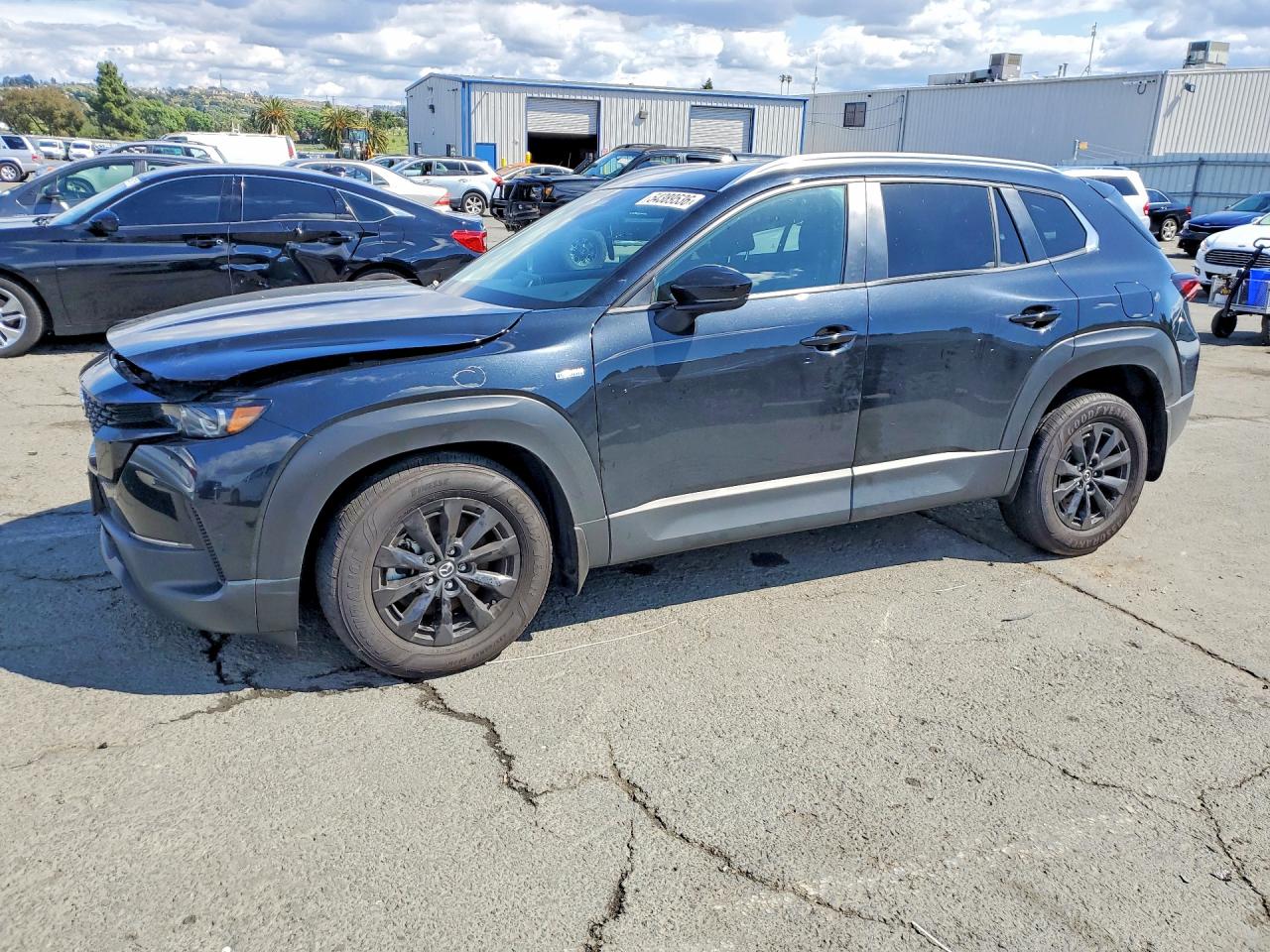 2025 Mazda CX-50 Hybrid Preferred Package, VIN 7MMVAABW5SN113068 — Side