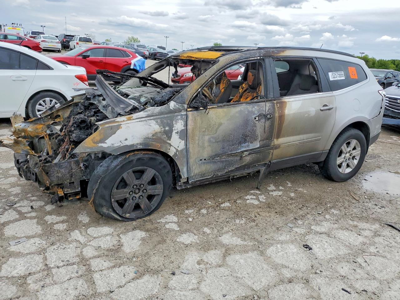 2009 Chevrolet Traverse 1LT, VIN 1GNER23D49S103663 — Burn