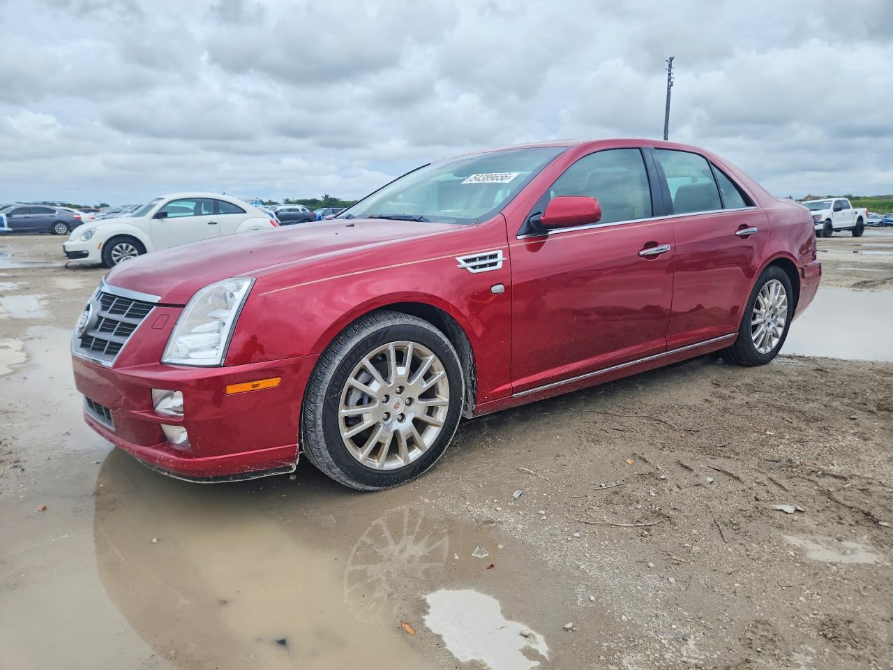 2011 Cadillac STS RWD, VIN 1G6DX6ED7B0160202 — Вандализм