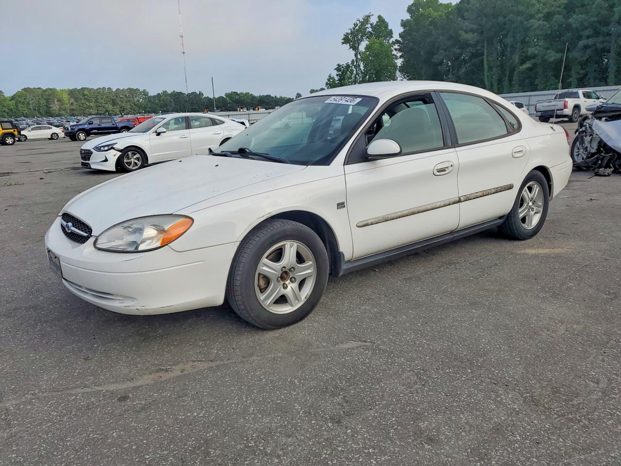 2001 Ford Taurus SEL, VIN 1FAFP56S21A176111 — Бок