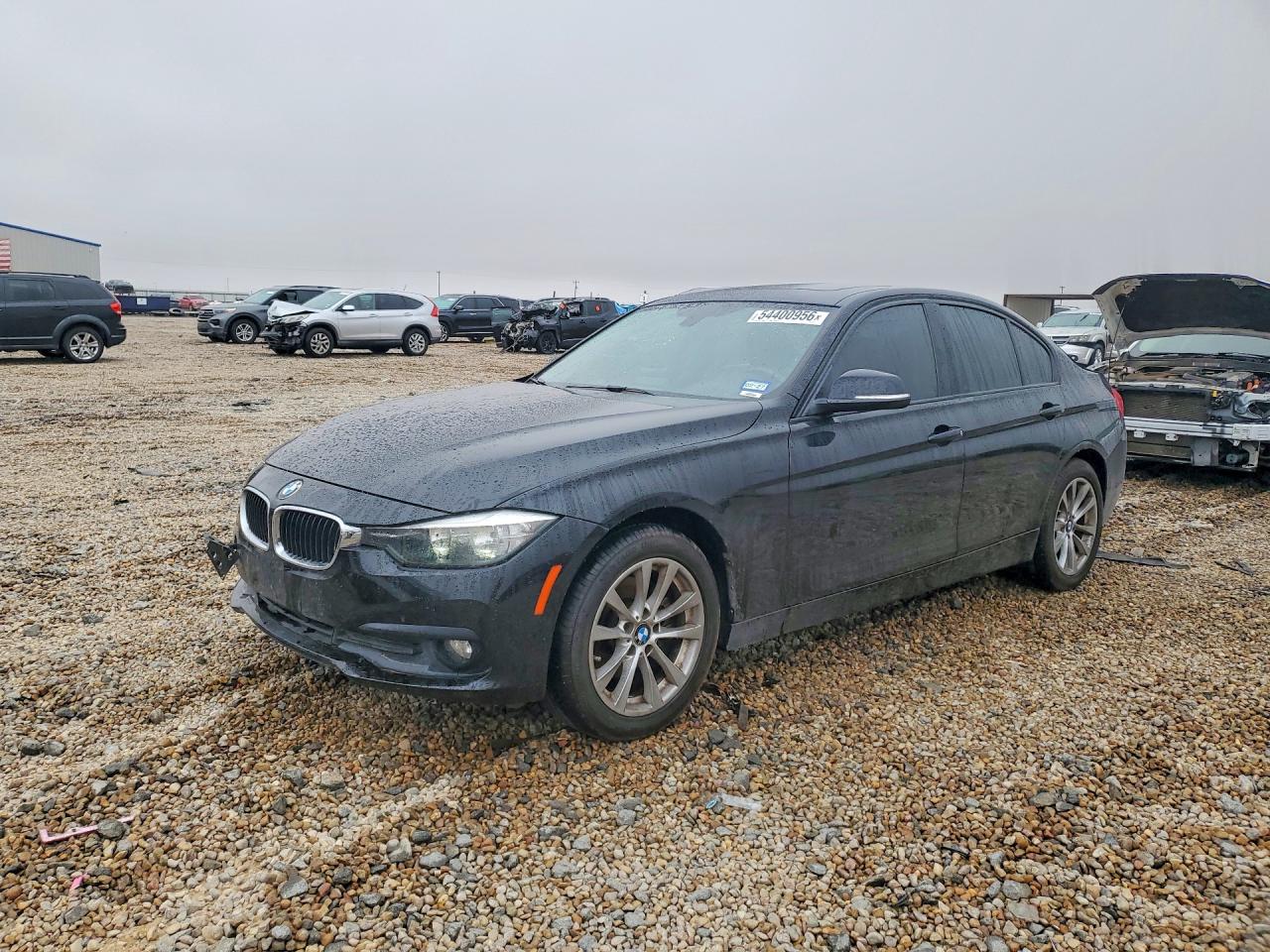 2016 BMW 3 Series 320i, VIN WBA8E1G55GNU10802 — Side