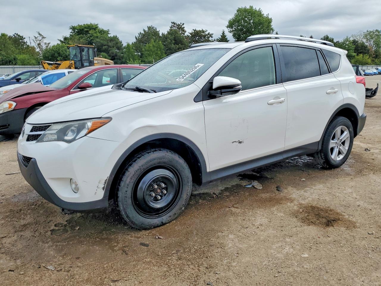 2013 Toyota RAV4 XLE, VIN JTMWFREV5D5004734 — Side