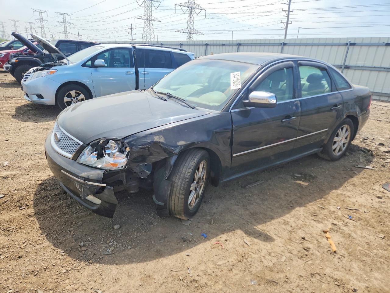 2005 Ford Five Hundred Limited, VIN 1FAFP28135G111242 — Side
