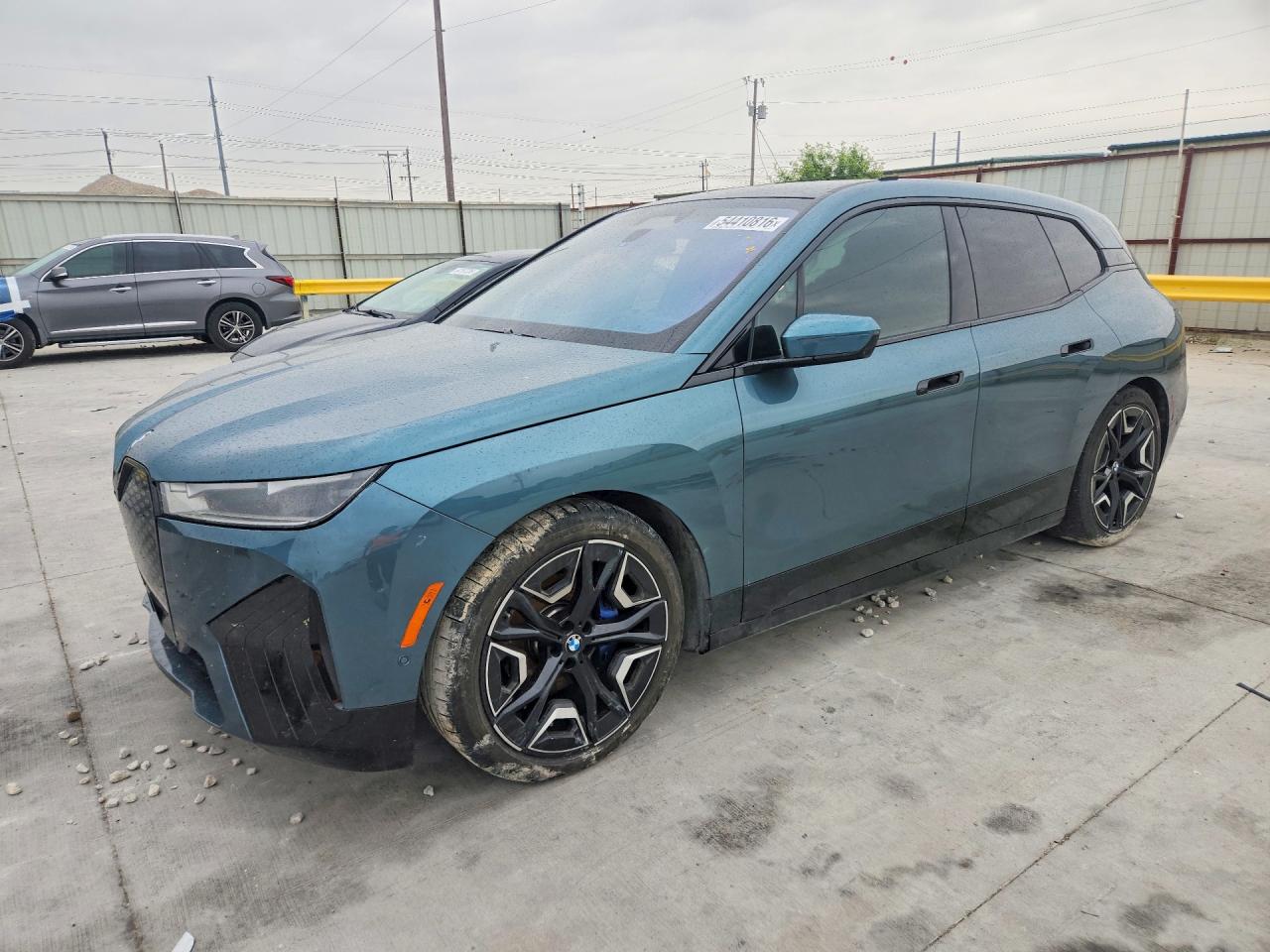 2025 BMW iX xDrive50, VIN WB523CF03SCT49398 — Side