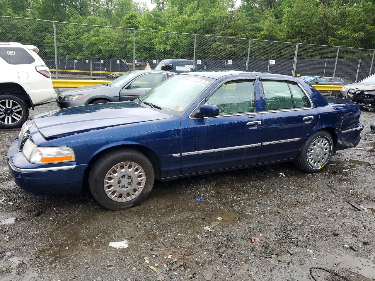 2004 Mercury Grand Marquis GS, VIN 2MEFM74W04X618396 — Rear end