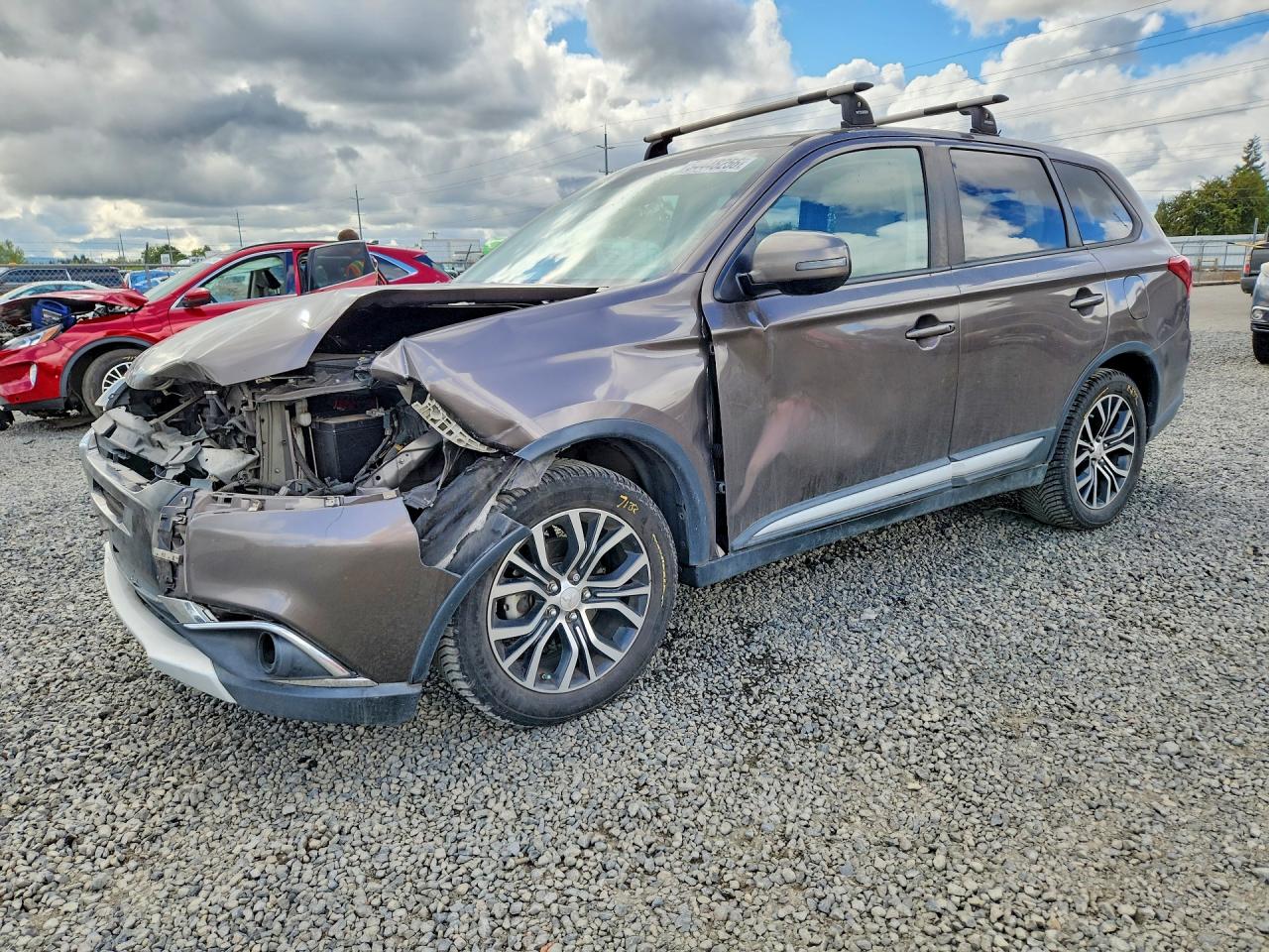 2016 Mitsubishi Outlander SE, VIN JA4AZ3A31GZ011027 — Front end